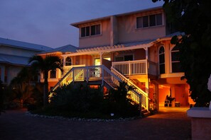 Evening view of front of villa