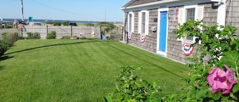 street side of house with ocean to left side