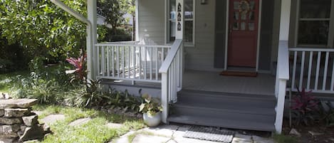 Two and a half blocks from the ocean, this little beach cottage is old Florida.