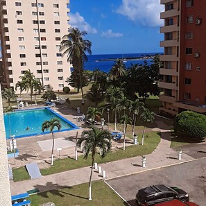 Overlooking Swimming pool  & Bay beach
