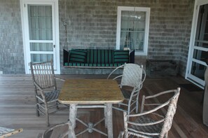 The Main House porch which is where people tend to congregate to talk & catch up