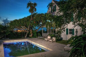 Buccaneer Hill luxuriously restored historic home with pool overlooking the harbor.  Walk to town and beach.