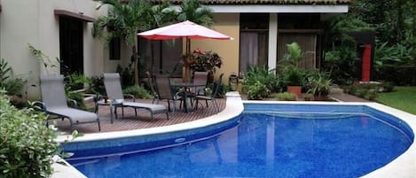 Private deck and pool with awesome view of rainforest covered mountain.