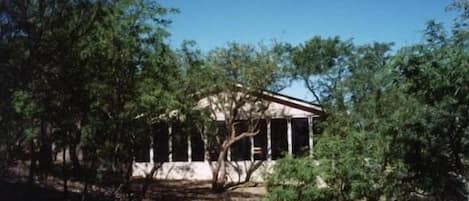 Front of House - large screen porch  for bird watching.