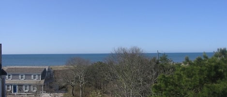 Enjoy sea views of Nantucket Sound from large, furnished upper deck.