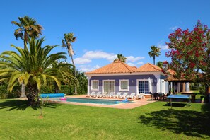 back garden and pool area 