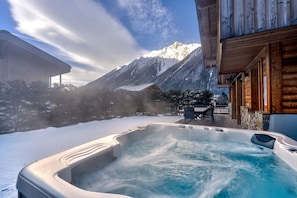Hot tub with mountain views