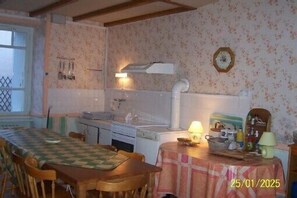 Large traditional rustic but well equipped kitchen