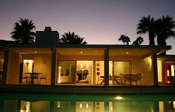 From the pool to the house at dusk