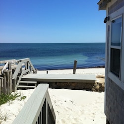 photo taken from porch--private deck right on the ocean; kayak, swim, fish,relax