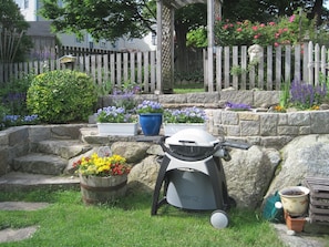 Gas BBQ and picnic terrace on upper level