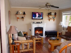 Open concept living room, dining room and kitchen on lower floor.