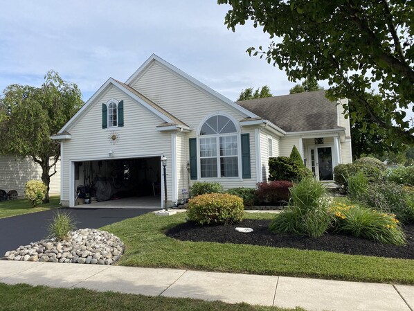 Front of house, parking for 4 cars