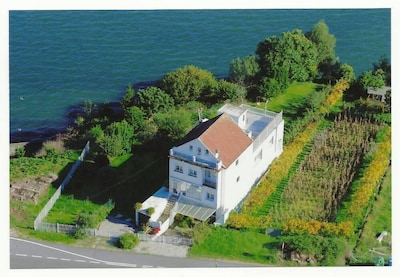 Wohnung in einem Einfamilienhaus mit Garten und herrlichem Meerblick