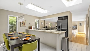 kitchen leading into open plan living area