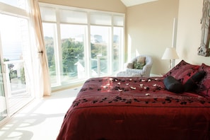 The Master bedroom has wall to wall windows for an unobstructed view