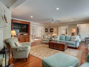 Living Room Opens to Kitchen and Dining Room at 4 Greenwood Court