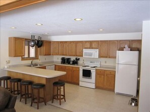 Fully Equipped Kitchen - Bar Seating for Five