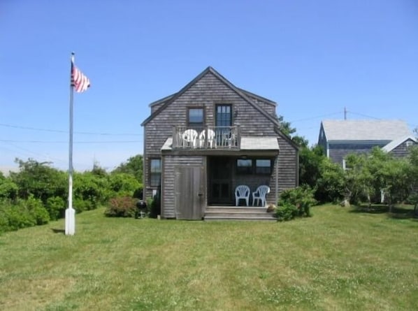 Large side yard and smaller yard on other side of house.  New kitchen!