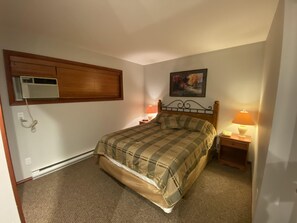 Queen size bed, large closet with desk
 