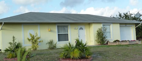 Beautifully  landscaped freshly painted home at the end of a quiet cul-de-sac