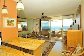 Looking out onto lanai & out to ocean with vast uninterrupted views.