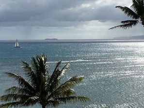 View from our lanai.  In Distance Molokini and Kahoolawe on right. Rain & sun!