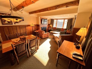 View of dining and living room from the kitchen in 3 bedroom unit.