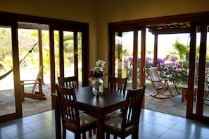 dining/ breakfast opens up to porch