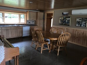 Dining room table expands to seat 12 so both side can dine together.   