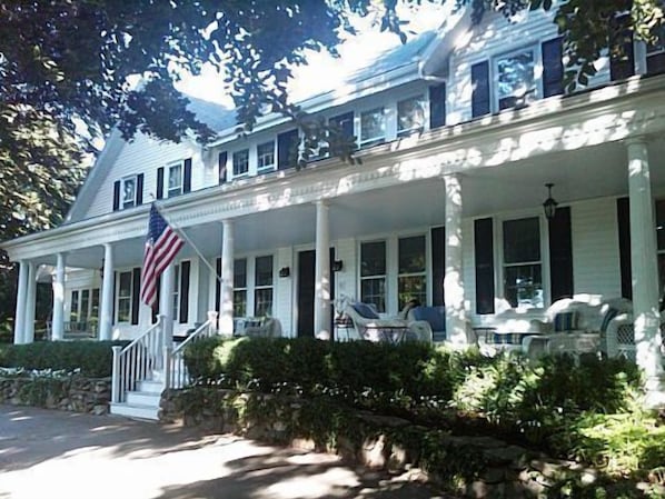 Sixty foot wicker furnished front porch