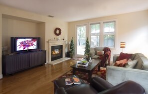 Family Room -Relax in front of the fireplace & 65" OLED TV (Netflix included).