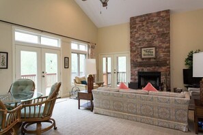 French doors in the dining and living areas provide easy access to the deck.