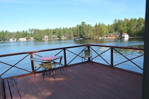 Boathouse deck.  To be replaced w/ poly-wood decking in spring 2023.