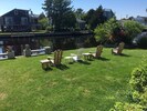 Relax in the Adirondack chairs and watch the boats and the ducks go by