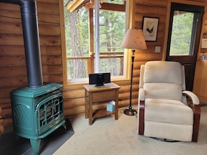 Cozy up to the propane fireplace in the chillier seasons.