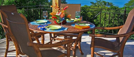 Dining on the veranda with a beautiful view of Flamingo Bay