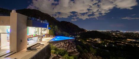 Immaculate nighttime view of Camelback Visa on Camelback Mountain w/ city views 