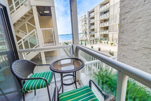 Covered patio seating with corner view of the bay!