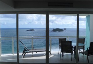 Lay in bed here, and watch the ocean all day