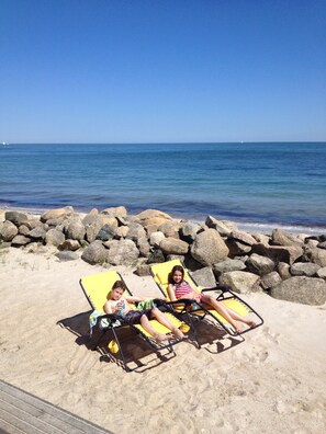 2 of my children lounging at the Seawith on our private beach, soakin it all in!