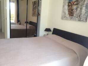 Master bedroom with kingsize bed