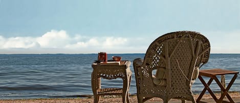 Relax on the wall-to-wall beach deck. Has both sunny and shaded, covered areas.