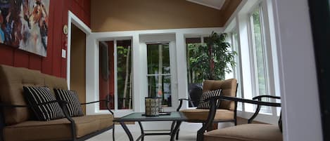 private sunroom and grill area just outside