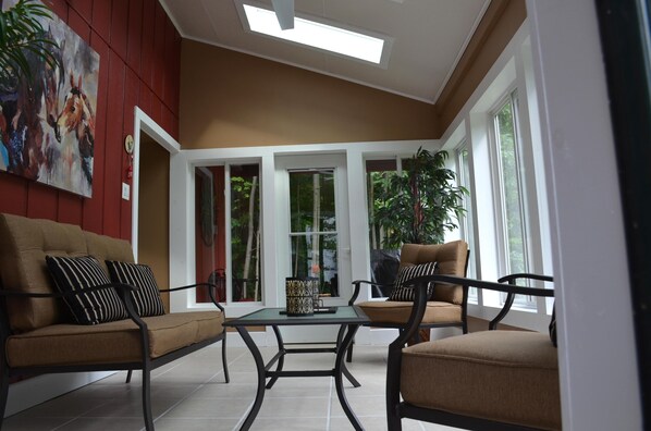 private sunroom and grill area just outside