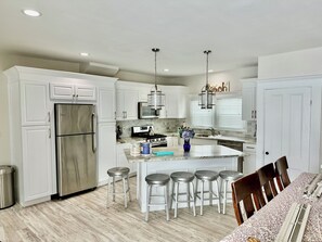 New Kitchen & Granite Island. Open Concept fits 18 comfortably Unit 2