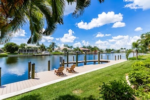 Large boat dock and sun deck with captain's walk.