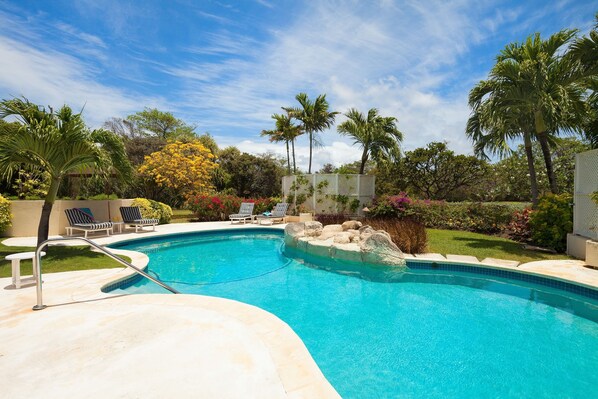 Hunter pool and gardens that are lit for evening enjoyment