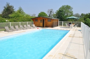 Swim in your own private pool, or relax on the sun terrace in sun loungers 