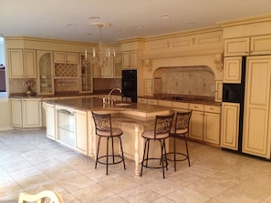 Custom Kitchen with Granite Counter tops. Plenty of room for cooking!
